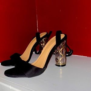 Black and gold heels